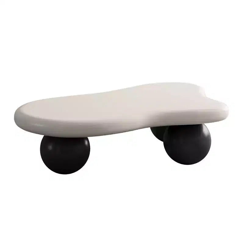 Table basse GDFStudio Dominic 40 avec plateau en bois en forme de nuage et pieds sphériques en plastique