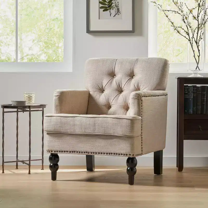 Fauteuil de club contemporain capitonné GDFStudio Aurelia avec clous décoratifs