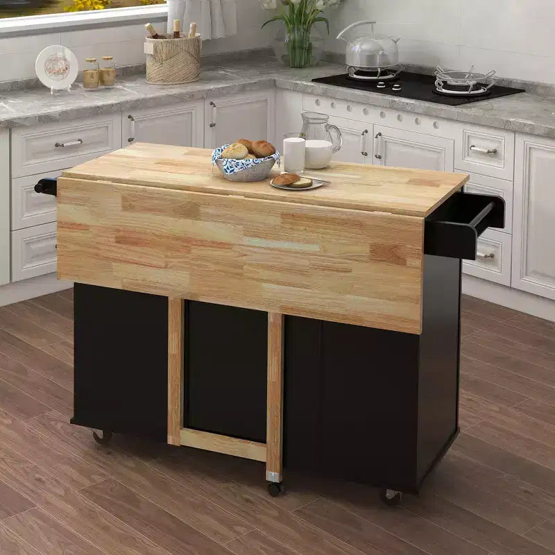JVNOXK Îlot de cuisine avec range-épices, porte-serviettes et plateau extensible en bois massif, roulettes verrouillables et espace de rangement, noir
