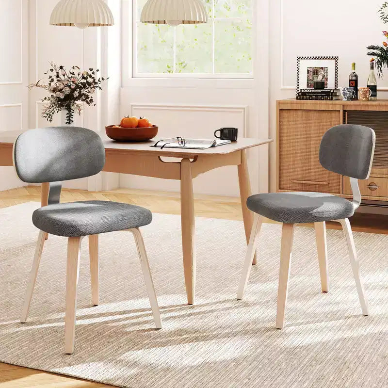 Chaises de salle à manger Costway lot de 4 avec dossier incurvé et assise rembourrée pour salle à manger et salon