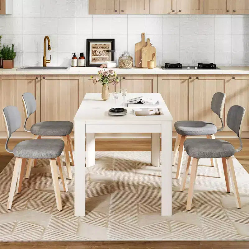 Chaises de salle à manger Costway lot de 4 avec dossier incurvé et assise rembourrée pour salle à manger et salon