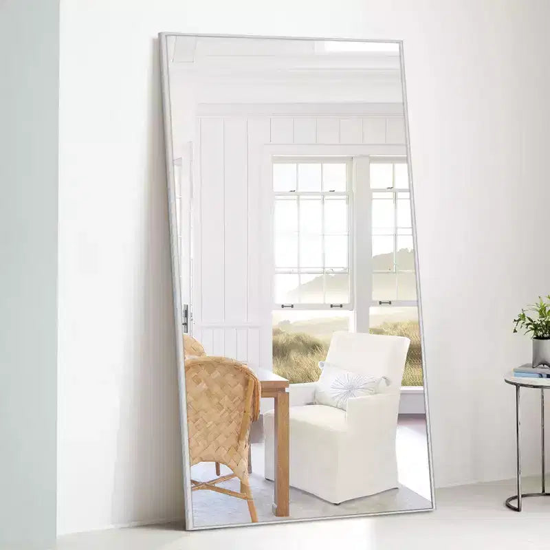 Miroir mural décoratif rectangulaire Dovelina à cadre métallique moderne