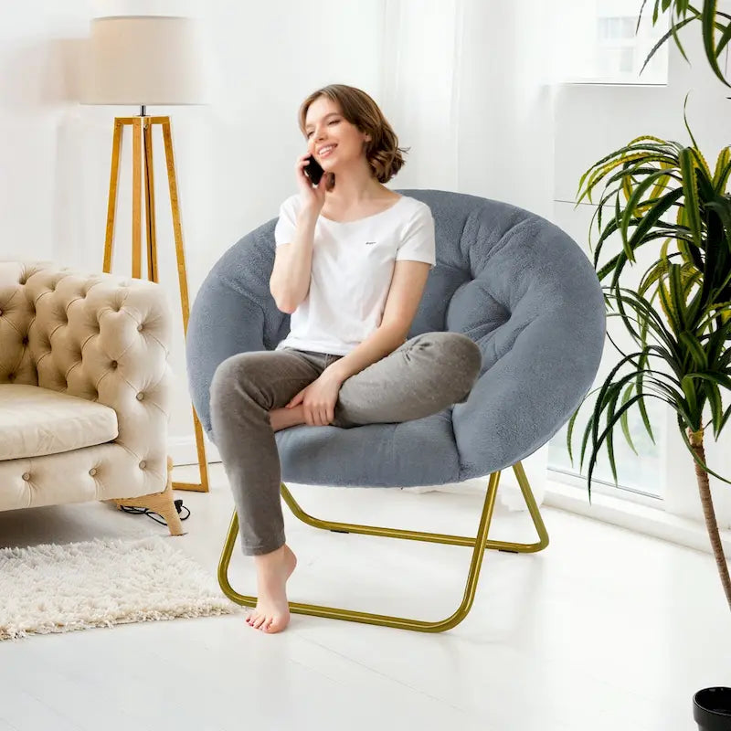 Fauteuil soucoupe pliable avec coussin en fausse fourrure