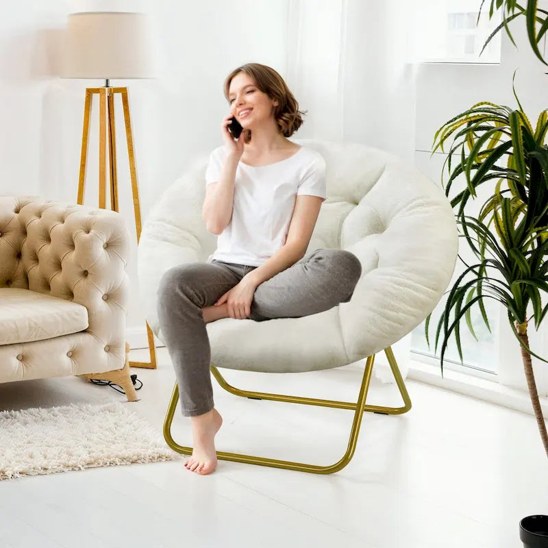 Fauteuil soucoupe pliable avec coussin en fausse fourrure