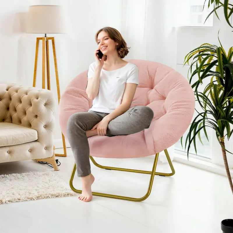 Fauteuil soucoupe pliable avec coussin en fausse fourrure