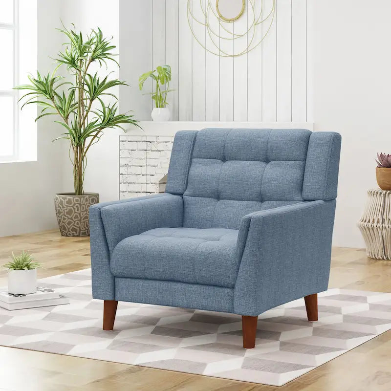 Fauteuil rembourré à dossier capitonné