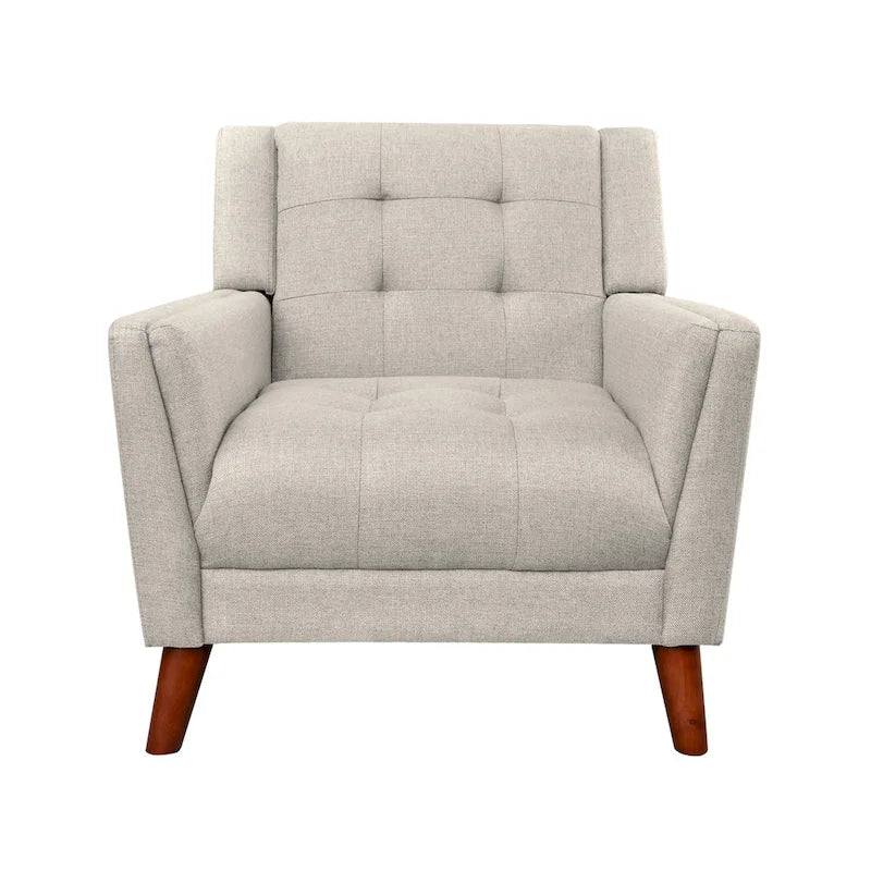 Fauteuil rembourré à dossier capitonné