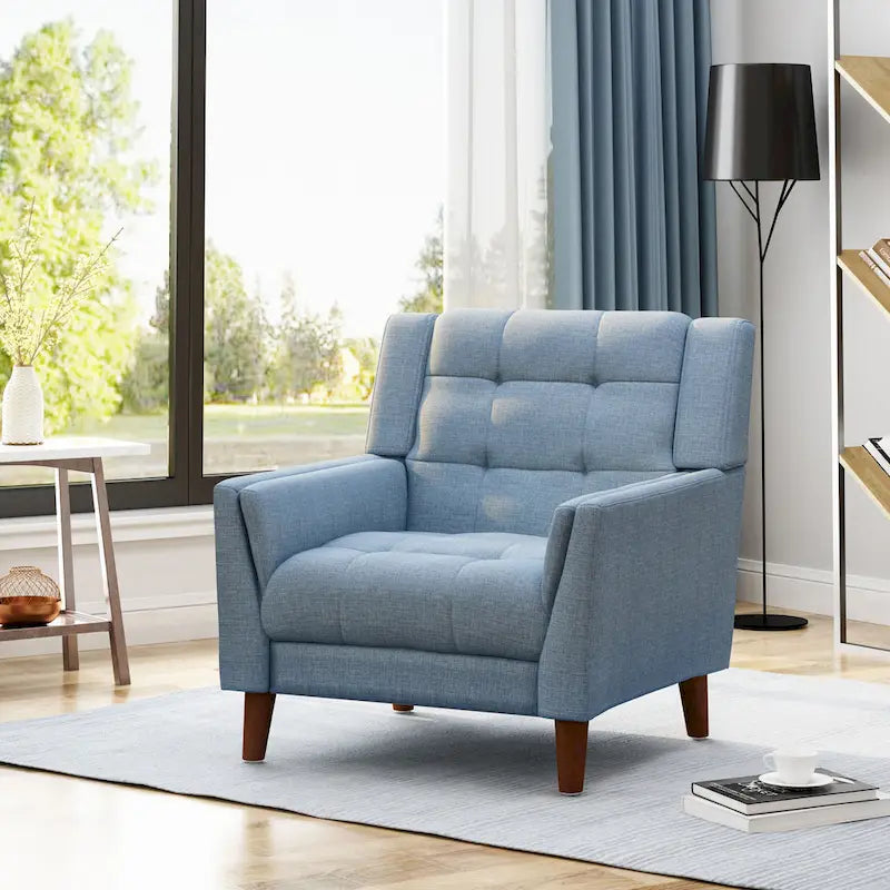 Fauteuil rembourré à dossier capitonné