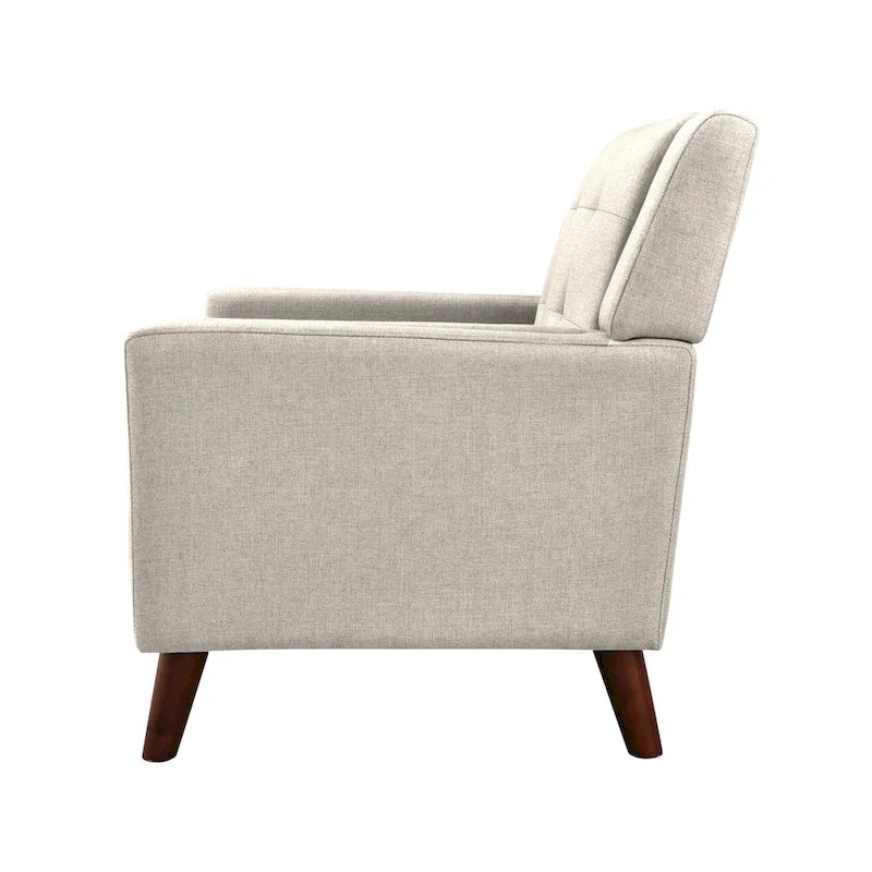 Fauteuil rembourré à dossier capitonné