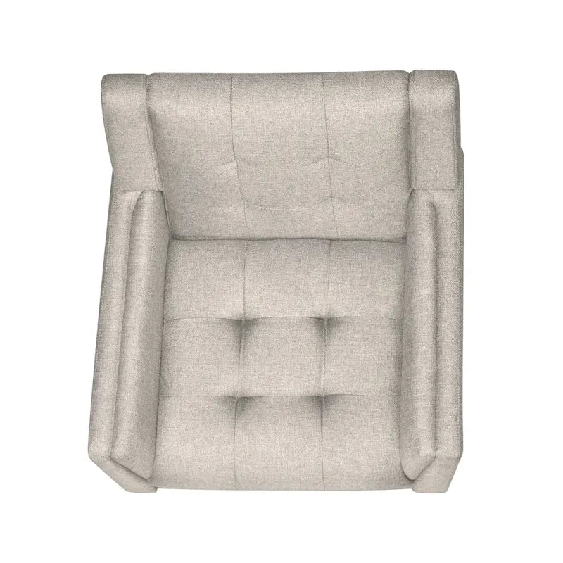 Fauteuil rembourré à dossier capitonné