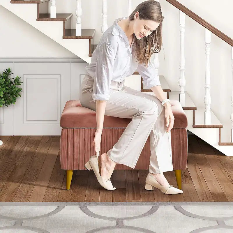 Banc de rangement capitonné avec revêtement en velours et pieds en métal